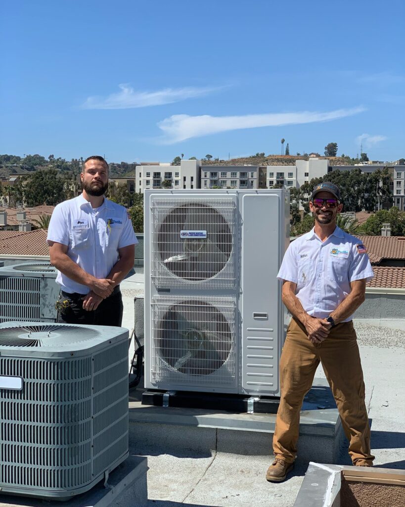Commercial Hvac Worker completing an installation in Mission Valley, Ca with this Installation the happy home owner gets a 2 year Maintenance